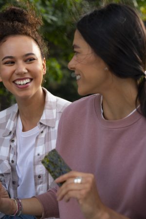 side-view-friends-eating-seaweed-snacks